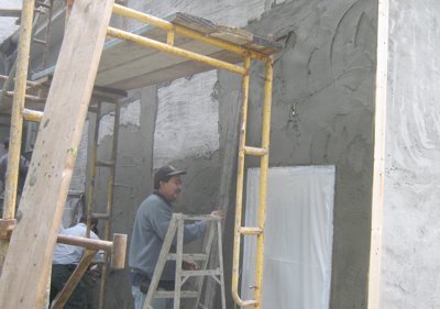 filling in between the screeds