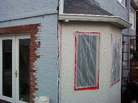 Bay window
              stuccoed