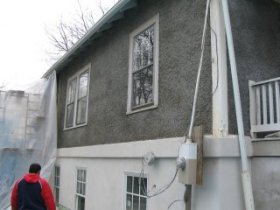 top floor has pebble dash stucco