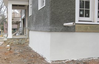 fake concrete bricks that were easily stuccoed over.