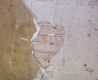 wood lath and lime and sand basecoat.