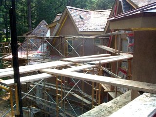 Dormers are
              finished with colored portland cement finish