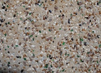 Aggregated stucco finish with colored rocks and glass